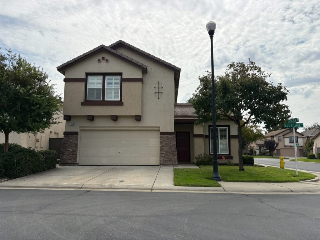 Two-story suburban home representing when to sell a house wisely