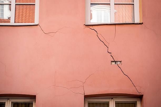 Cracked exterior wall indicating potential foundation issues
