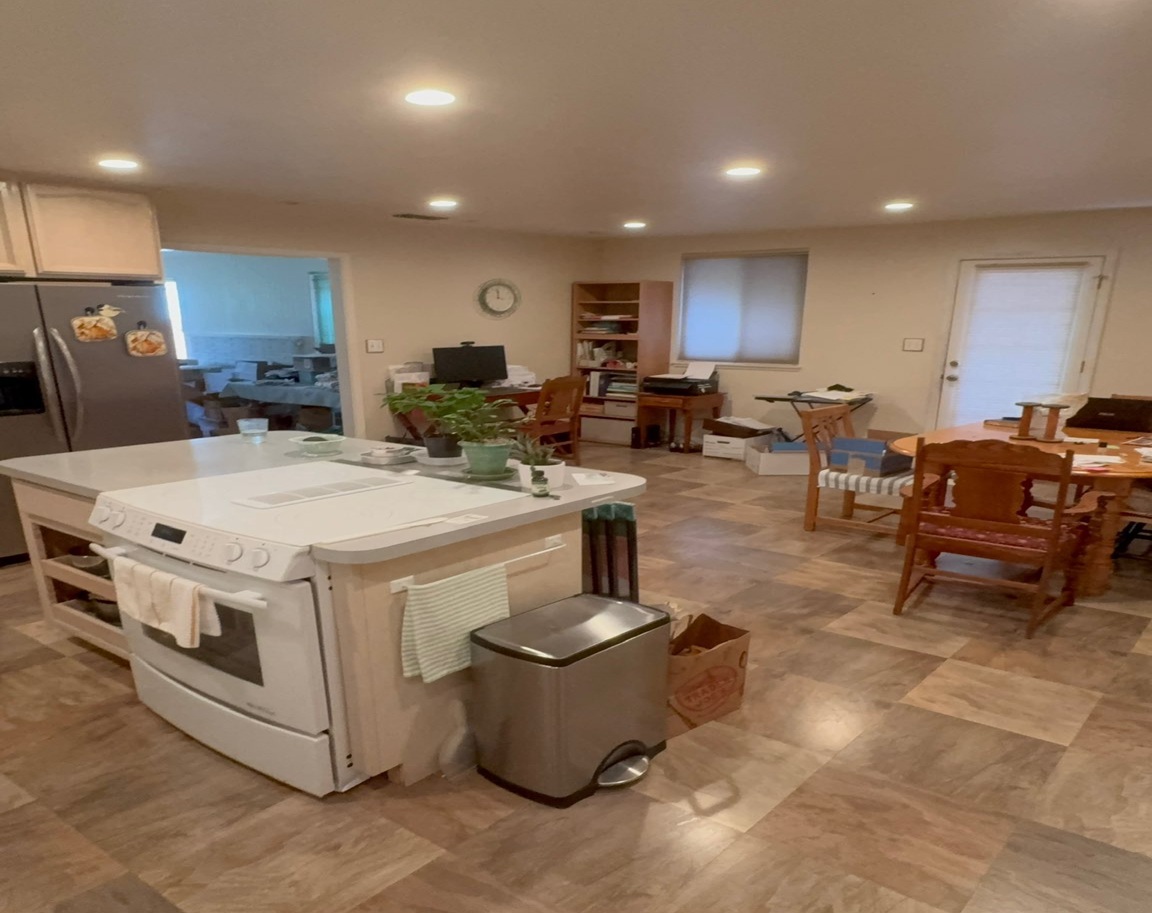 Bright open-concept kitchen and dining space ideal for family living
